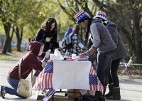 Youth registering to vote at an outside location