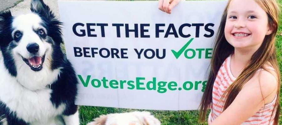 Get the Facts before you vote with Voter's Edge voter's edge lawn signs wth dogs